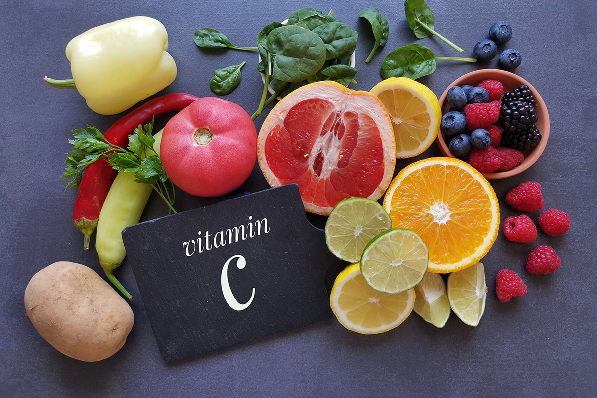 Food high in vitamin C (ascorbic acid) for strong immune system and skin health. Fresh fruits and vegetables as natural sources of vitamin C. Healthy foods rich in vitamin C.