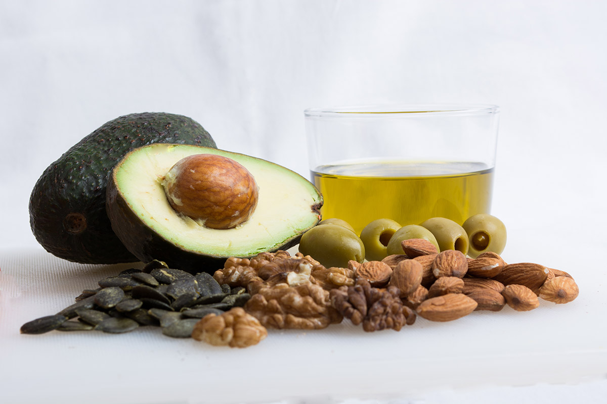 Some Healthy Food With Avocado, Nut, Olive Oil And Olive